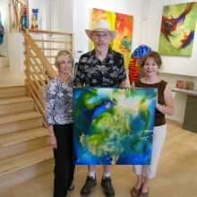 Skip and Ken Pollock with their new Pippin painting.