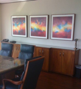 Commission paintings by Aleta Pippin in one of her major collectors' conference room.